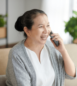 senior patient talking in phone to make appointment with home care company